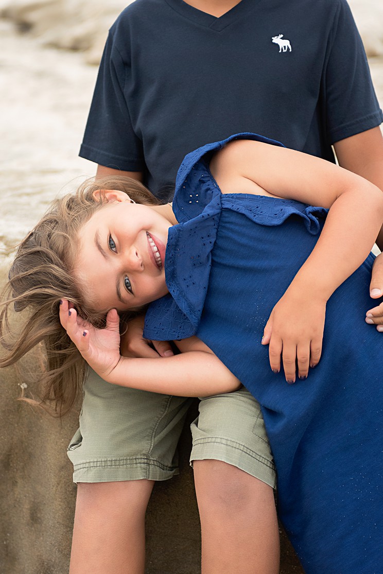 sister and brother on beach