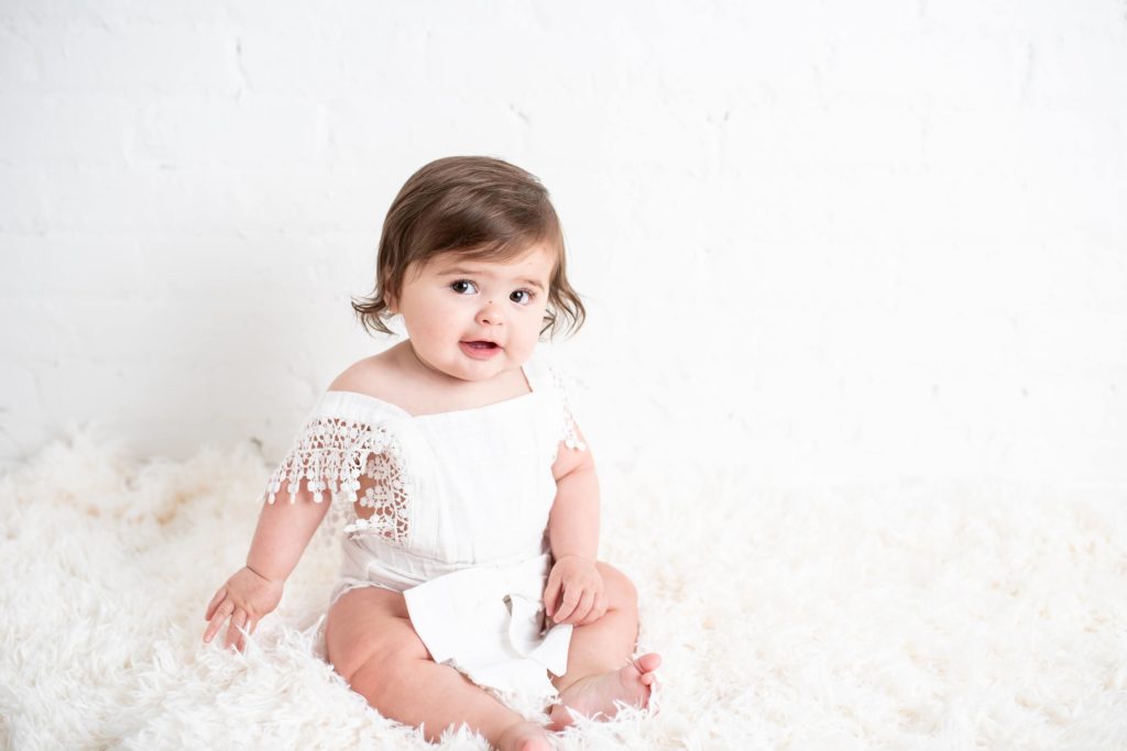 baby dressed in outfit from San Diego baby boutiques