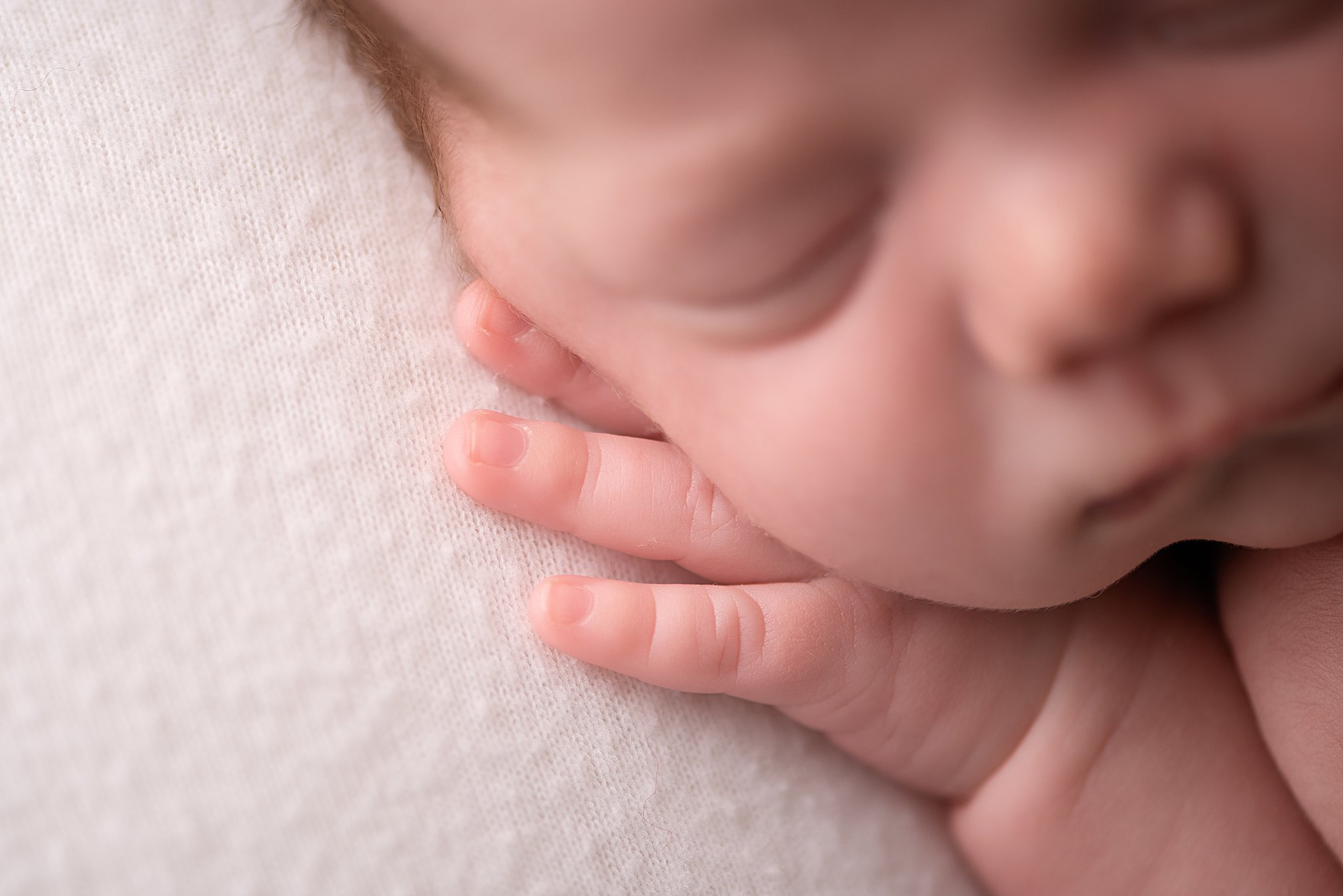 Details of a sleeping newborn baby